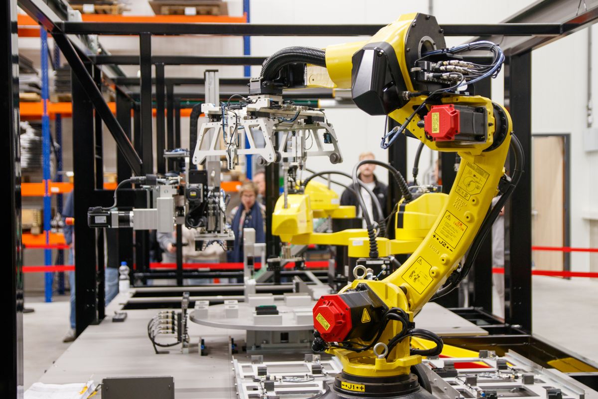 Industrial robotic arm on an automated manufacturing line
